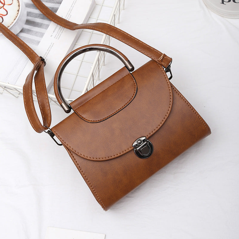 Hand strap shoulder bag