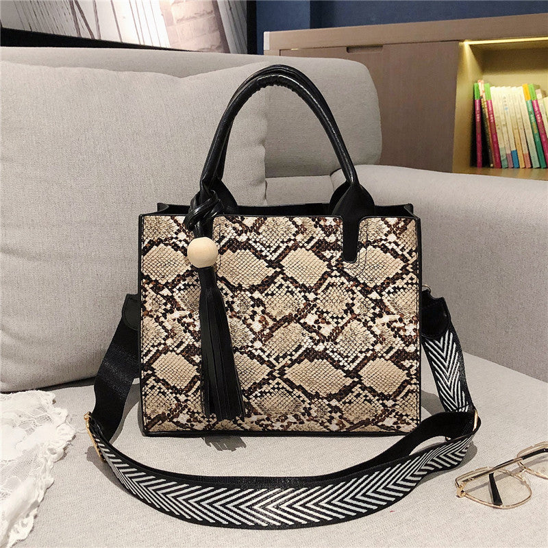 Snake hand bag